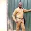 Profile photo of a man standing